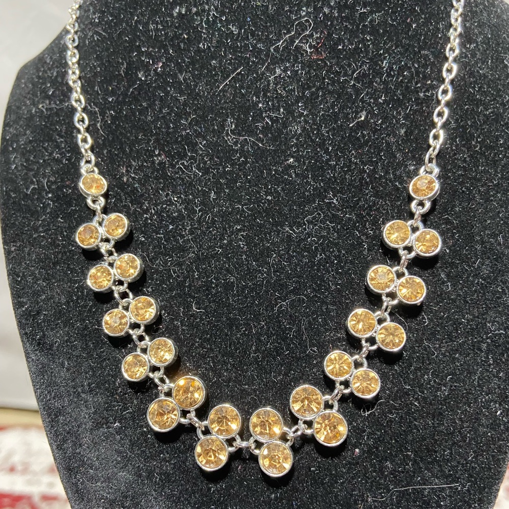 Silver Tone Necklace With Double Light Orange Rhinestines